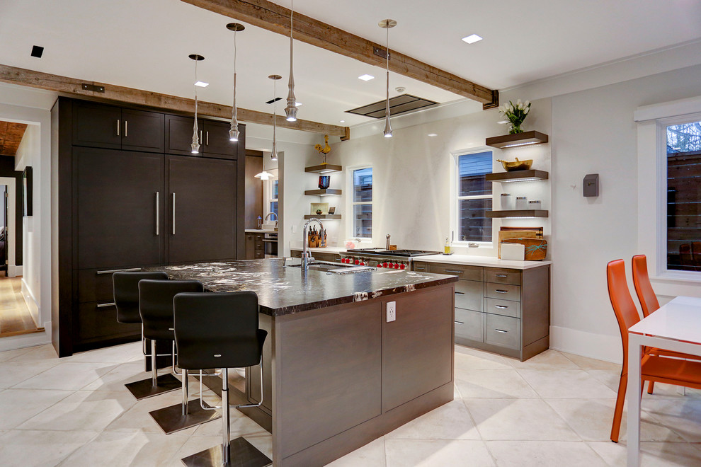 Medium sized contemporary galley kitchen pantry in Houston with a submerged sink, shaker cabinets, brown cabinets, engineered stone countertops, white splashback, stone slab splashback, stainless steel appliances, terracotta flooring and an island.