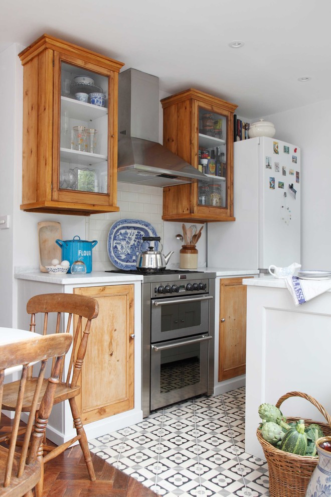 This is an example of a farmhouse kitchen in Surrey.
