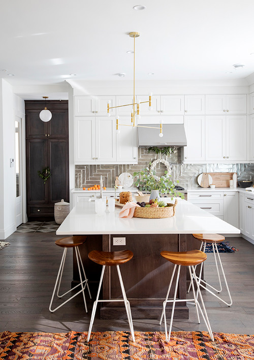 Elevate Your Kitchen Style: White Shaker Cabinets and Brown Herringbone Tile Backsplash Ideas