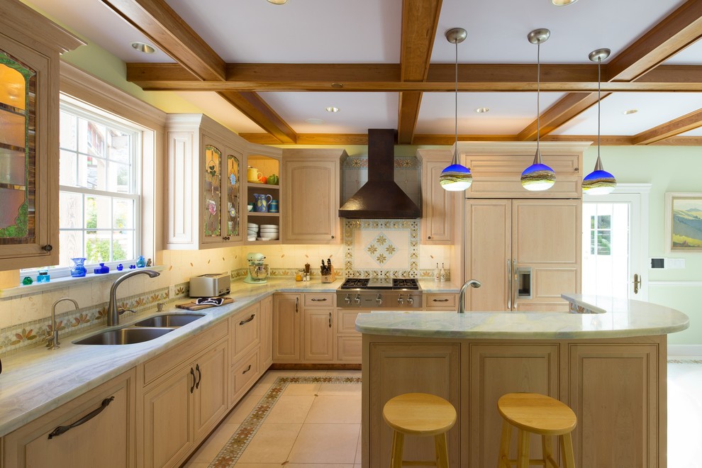 Inspiration for a large craftsman l-shaped ceramic tile eat-in kitchen remodel in San Luis Obispo with a double-bowl sink, raised-panel cabinets, light wood cabinets, marble countertops, beige backsplash, ceramic backsplash, stainless steel appliances and an island