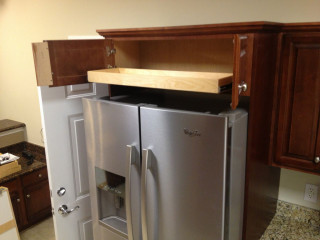 Floating shelves above fridge deals