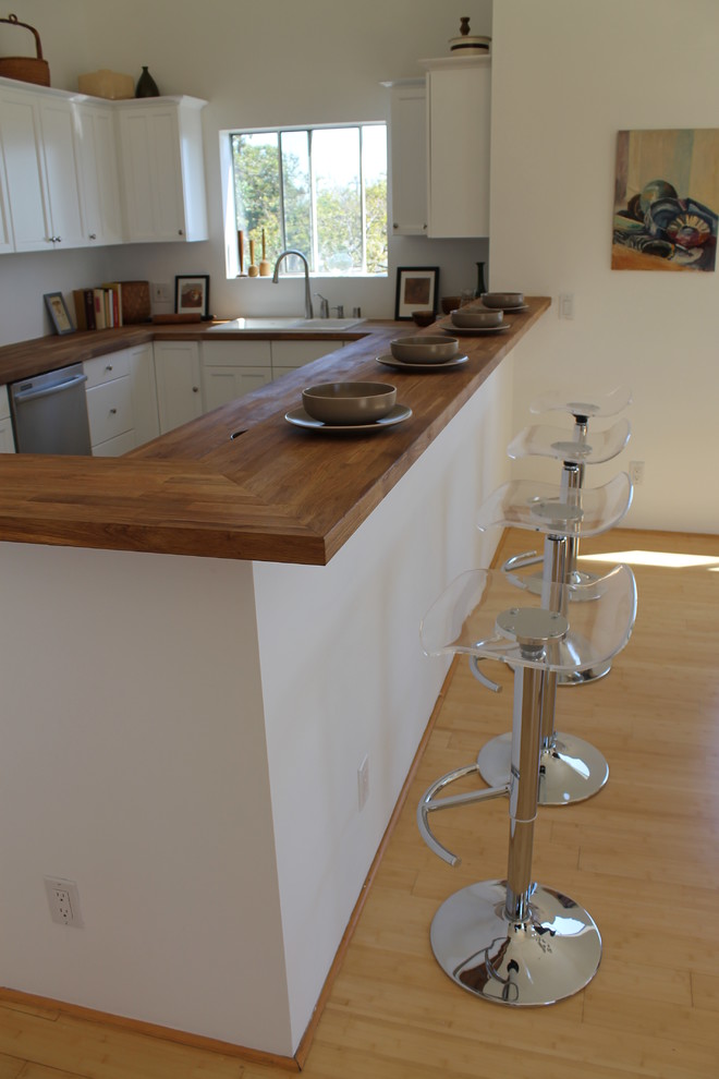 Acrylic Bar Stools With Butcher Block Top Kitchen Peninsula Modern Kitchen Los Angeles By Madison Modern Home