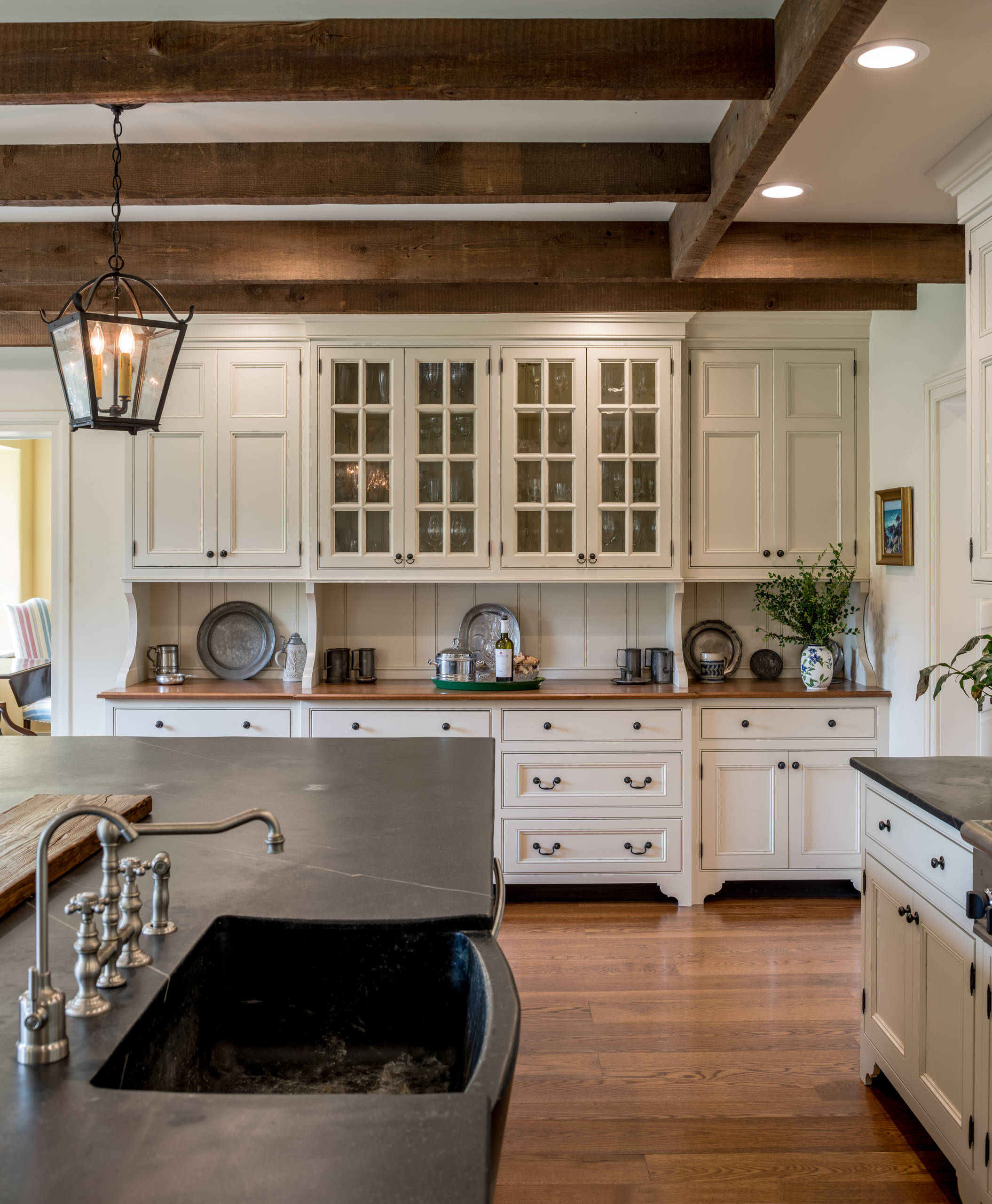 Beige cabinets black sales countertops
