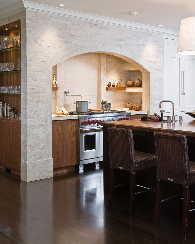 Transitional kitchen photo in Boston with wood countertops, flat-panel cabinets and medium tone wood cabinets