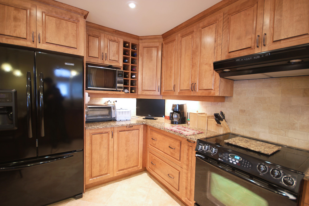 Medium sized l-shaped kitchen/diner in Ottawa with a double-bowl sink, beaded cabinets, medium wood cabinets, quartz worktops, yellow splashback, black appliances, ceramic flooring and a breakfast bar.