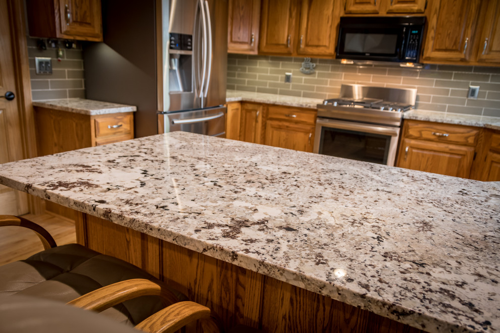 Alaska White Granite with Oak Kitchen Traditional Kitchen