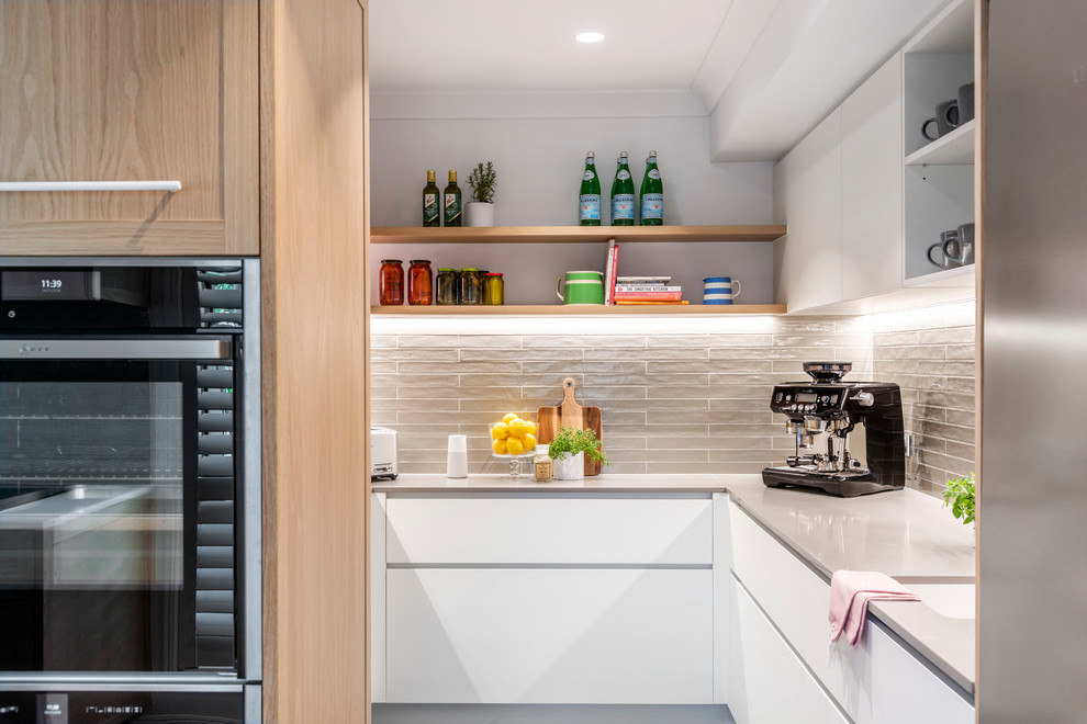 Photo of a medium sized contemporary galley kitchen in Brisbane.