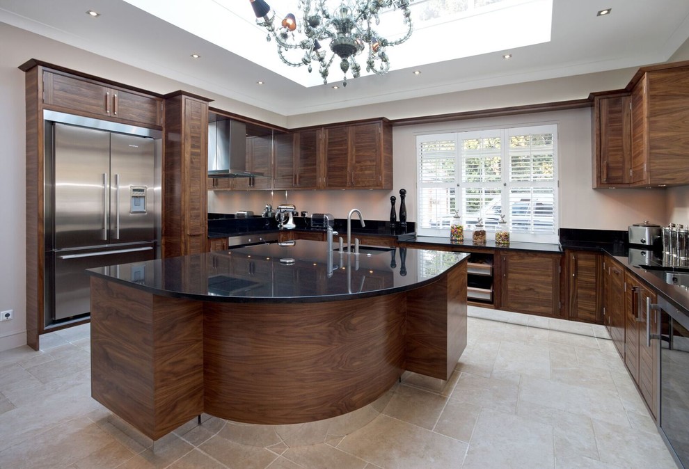 Open concept kitchen - large contemporary u-shaped ceramic tile open concept kitchen idea in Hertfordshire with an undermount sink, flat-panel cabinets, medium tone wood cabinets, solid surface countertops, stainless steel appliances and a peninsula