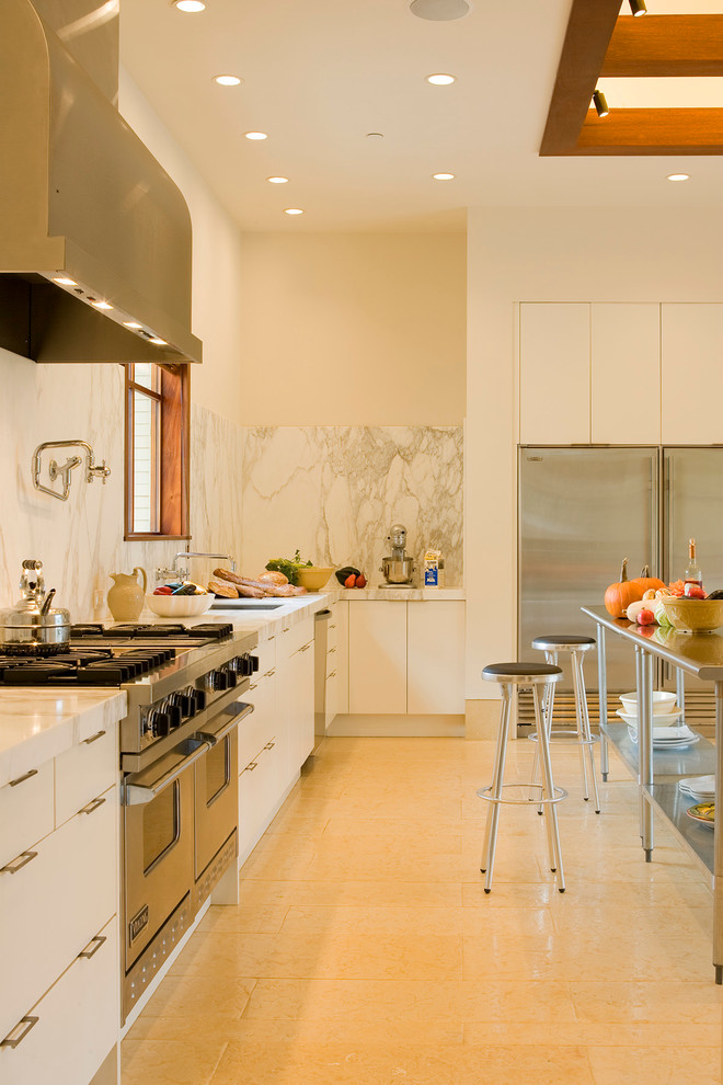 This is an example of a contemporary kitchen in San Francisco with white splashback and marble splashback.