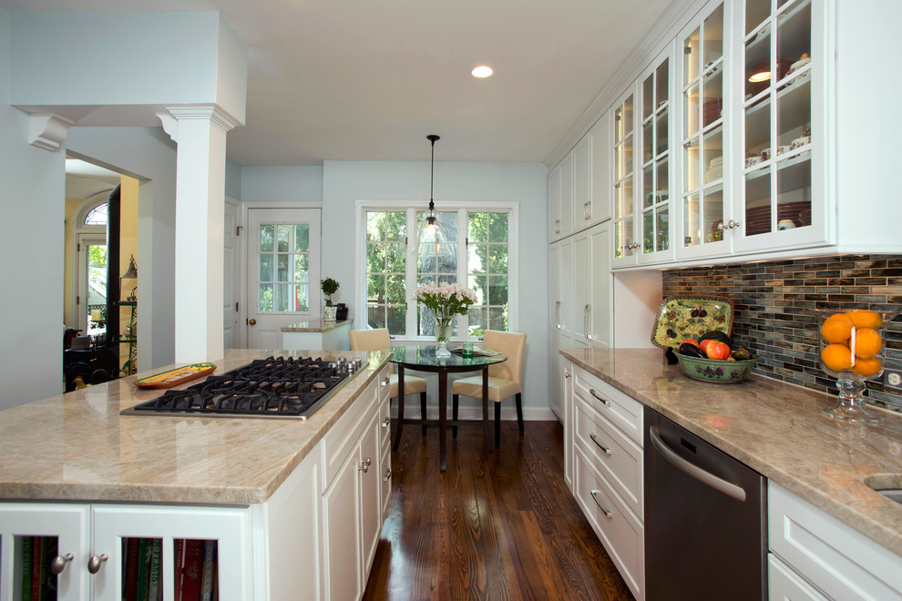 Enclosed kitchen - small traditional l-shaped medium tone wood floor enclosed kitchen idea in DC Metro with a double-bowl sink, recessed-panel cabinets, white cabinets, granite countertops, green backsplash, glass tile backsplash, stainless steel appliances and an island