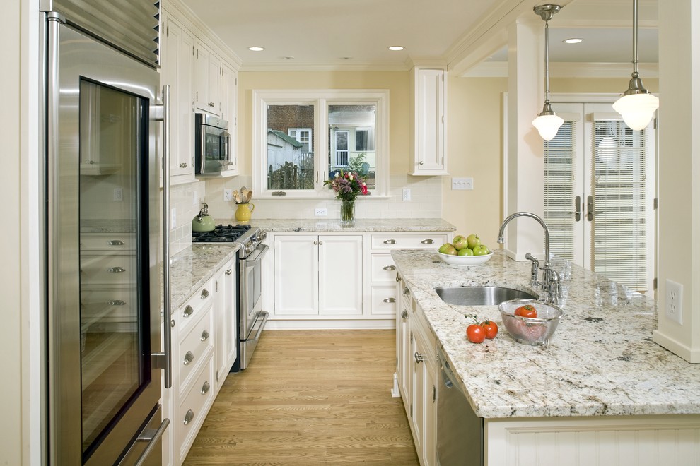 Kitchen - traditional kitchen idea in DC Metro with stainless steel appliances and granite countertops