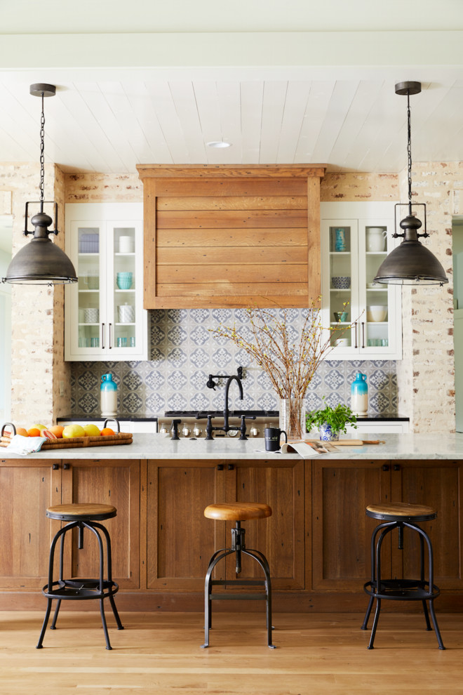 Example of a cottage kitchen design in Charlotte