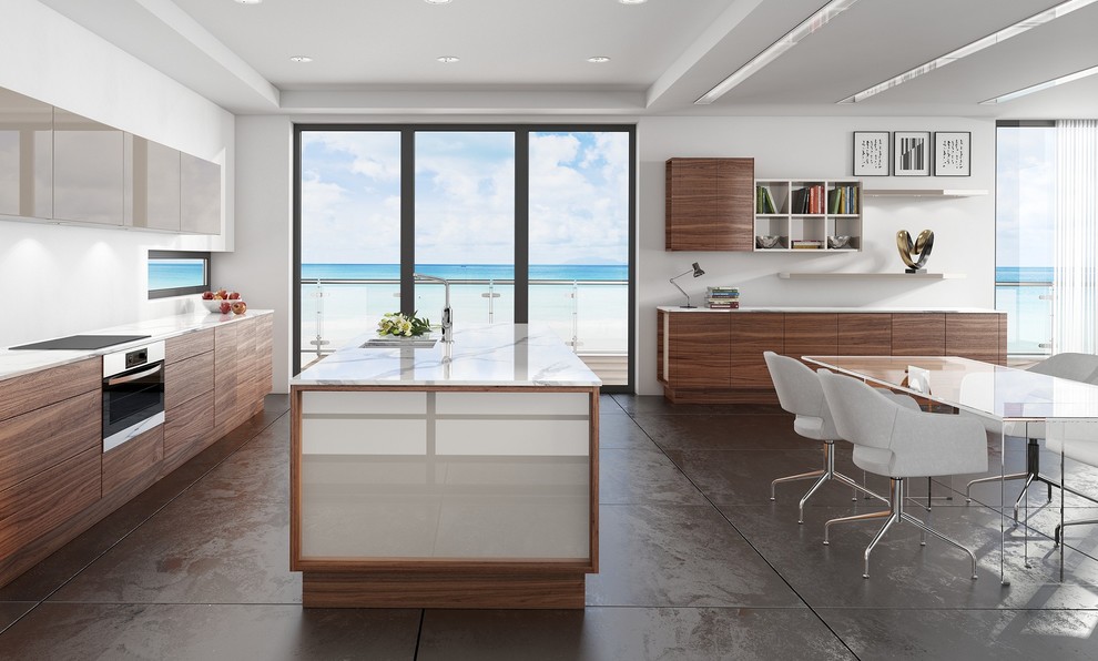 Inspiration for a large contemporary single-wall marble floor open concept kitchen remodel in Cambridgeshire with a double-bowl sink, glass-front cabinets, medium tone wood cabinets, marble countertops, multicolored backsplash, mirror backsplash, stainless steel appliances and an island