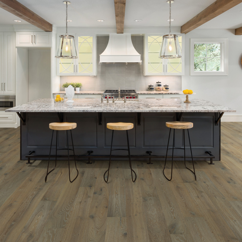 Inspiration for a large contemporary galley light wood floor enclosed kitchen remodel in Los Angeles with a double-bowl sink, recessed-panel cabinets, blue cabinets, granite countertops, porcelain backsplash, black appliances, an island and white countertops