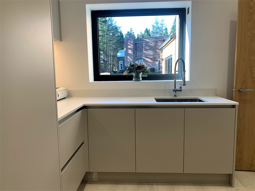 American Walnut Pattern Matched Corian Waterfall Island Kitchen