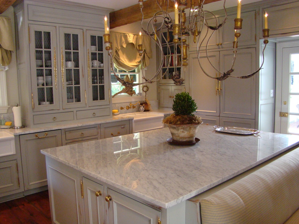 Inspiration for a timeless kitchen remodel in Other with a farmhouse sink, beaded inset cabinets and beige cabinets