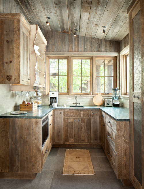 Barnwood Kitchens for a Rustic Look; reclaimed wood from old barns added to kitchens to bring out that farmhouse feel!