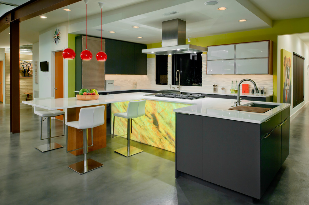 Example of a large trendy l-shaped concrete floor and gray floor open concept kitchen design in Baltimore with an undermount sink, flat-panel cabinets, gray cabinets, quartz countertops, white backsplash, cement tile backsplash, stainless steel appliances, an island and white countertops