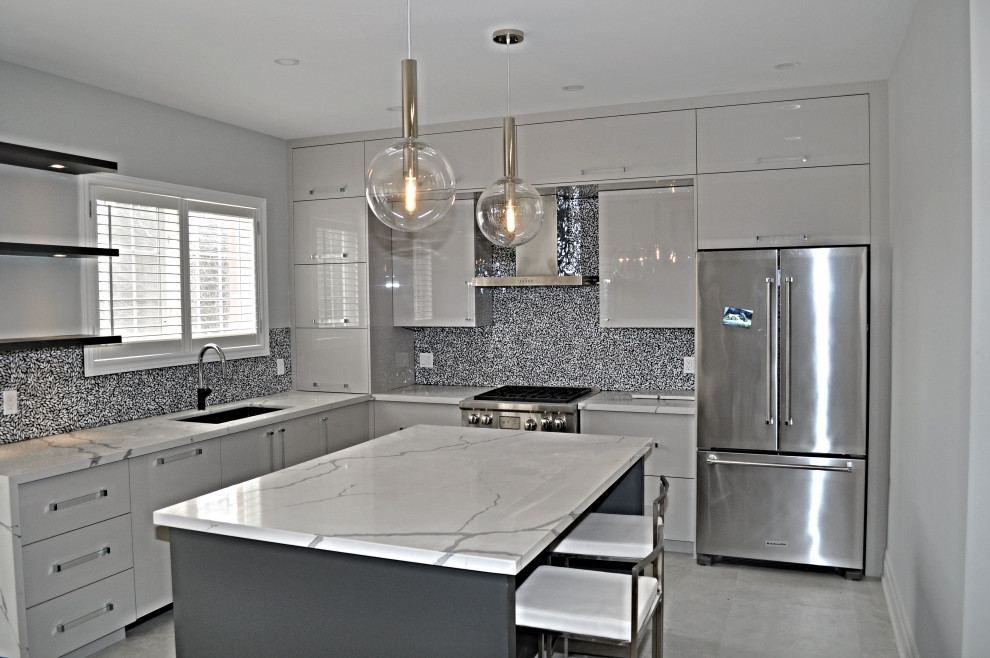 Example of a mid-sized minimalist l-shaped porcelain tile and white floor eat-in kitchen design in Toronto with an undermount sink, flat-panel cabinets, gray cabinets, quartz countertops, white backsplash, mosaic tile backsplash, stainless steel appliances, an island and white countertops