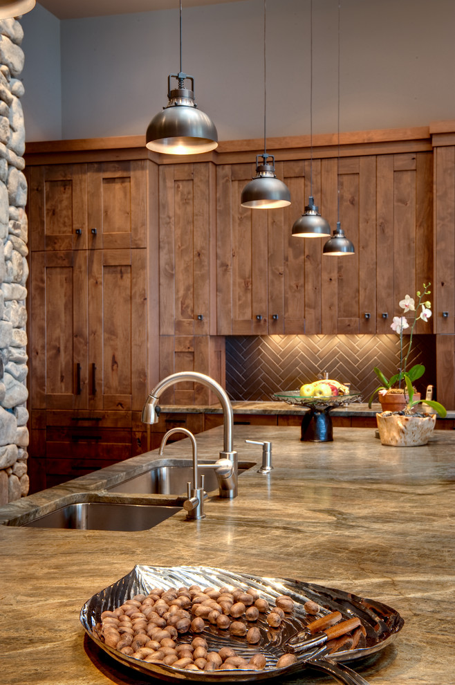 Rustic kitchen in Atlanta with a submerged sink, medium wood cabinets and brown splashback.