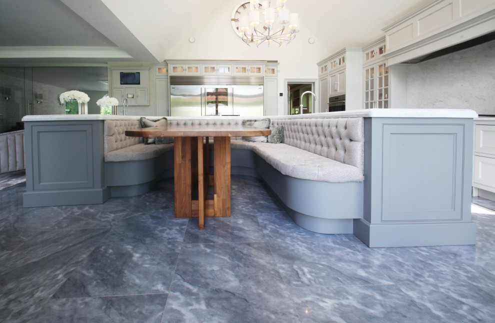 Design ideas for an expansive classic l-shaped kitchen/diner in Buckinghamshire with a built-in sink, shaker cabinets, grey cabinets, quartz worktops, white splashback, marble splashback, stainless steel appliances, marble flooring, an island, blue floors, white worktops and a vaulted ceiling.