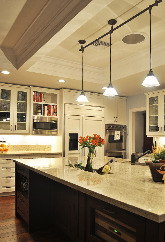 Inspiration for a timeless kitchen remodel in Phoenix with paneled appliances and granite countertops
