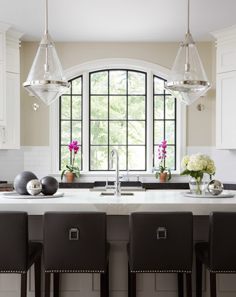 Arched Window with Dark Frame in Kitchen Transitional Kitchen