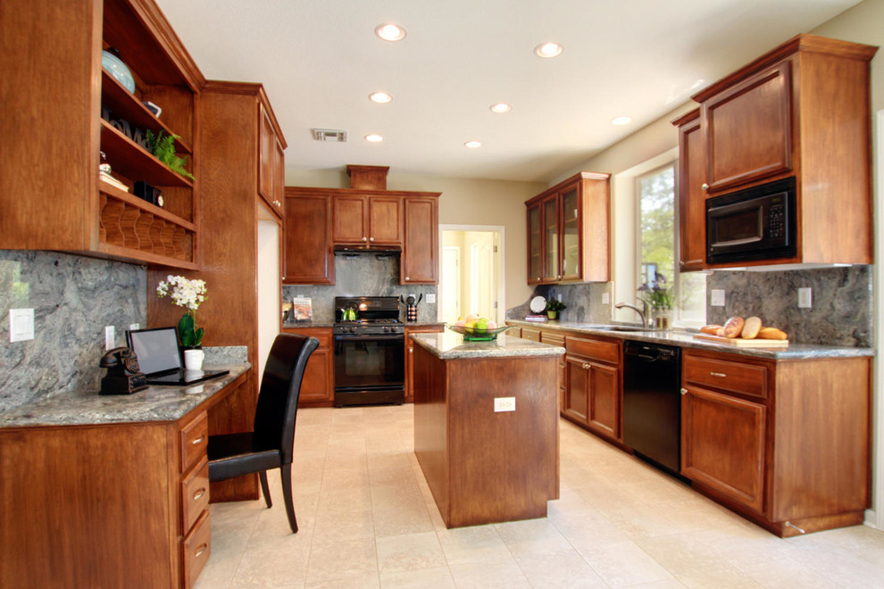 Example of a classic u-shaped open concept kitchen design in Sacramento with an undermount sink, flat-panel cabinets, dark wood cabinets, granite countertops, green backsplash, stone slab backsplash and black appliances