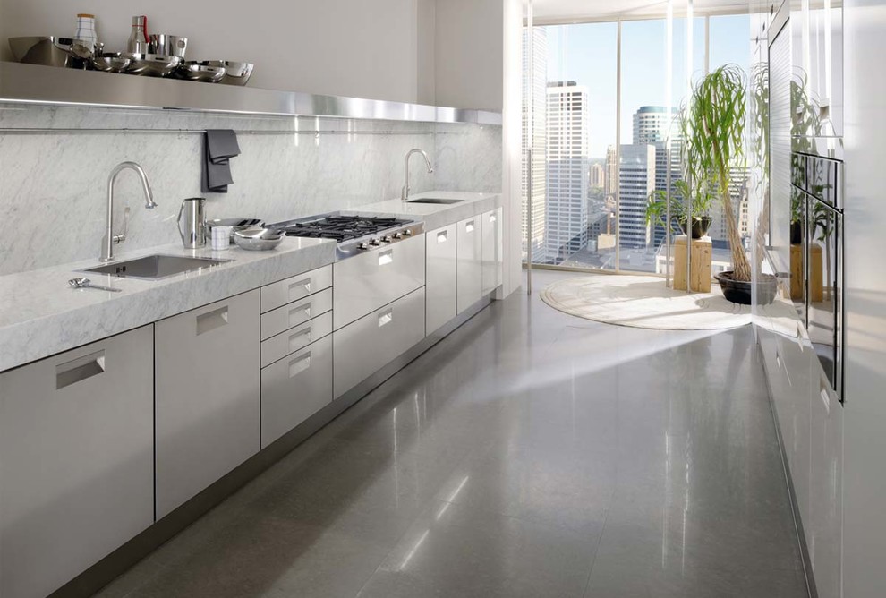 Esempio di una cucina design con ante lisce, ante in acciaio inossidabile, top in marmo, elettrodomestici in acciaio inossidabile e pavimento con piastrelle in ceramica