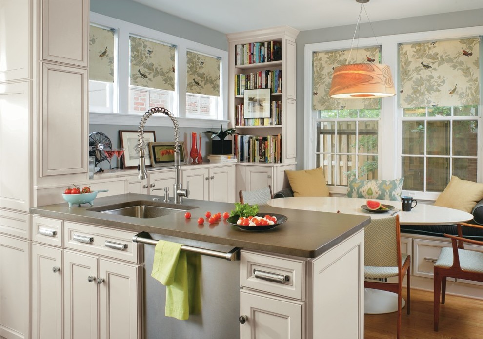 Transitional eat-in kitchen photo in Other with beige cabinets, stainless steel appliances and an undermount sink