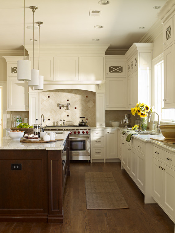 Inspiration for a large timeless l-shaped dark wood floor eat-in kitchen remodel in DC Metro with an undermount sink, beaded inset cabinets, white cabinets, granite countertops, beige backsplash, ceramic backsplash, stainless steel appliances and an island