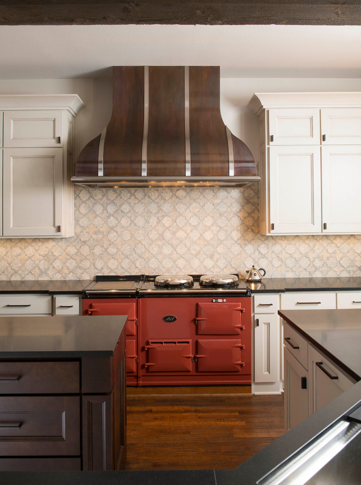 Transitional kitchen photo in Dallas with two islands