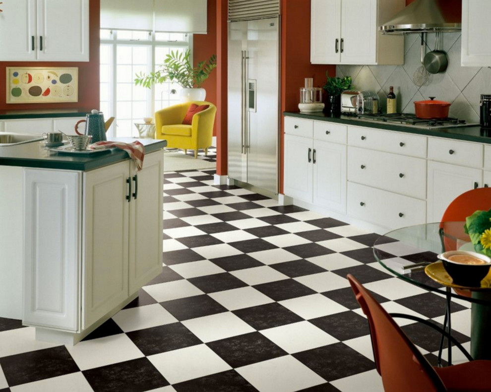 Eat-in kitchen - large transitional u-shaped linoleum floor and multicolored floor eat-in kitchen idea in Other with a drop-in sink, flat-panel cabinets, white cabinets, solid surface countertops, gray backsplash, cement tile backsplash, stainless steel appliances and an island