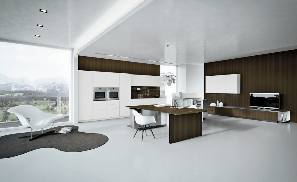 Bild på ett funkis linjärt kök, med släta luckor, vita skåp och betonggolv