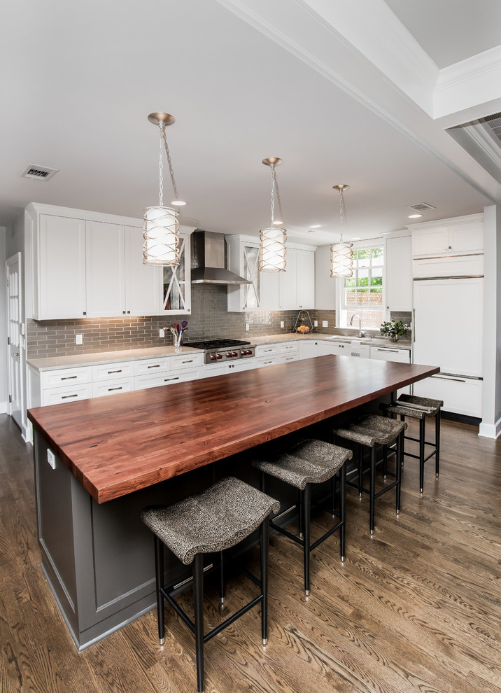 Large transitional l-shaped eat-in kitchen photo in Austin