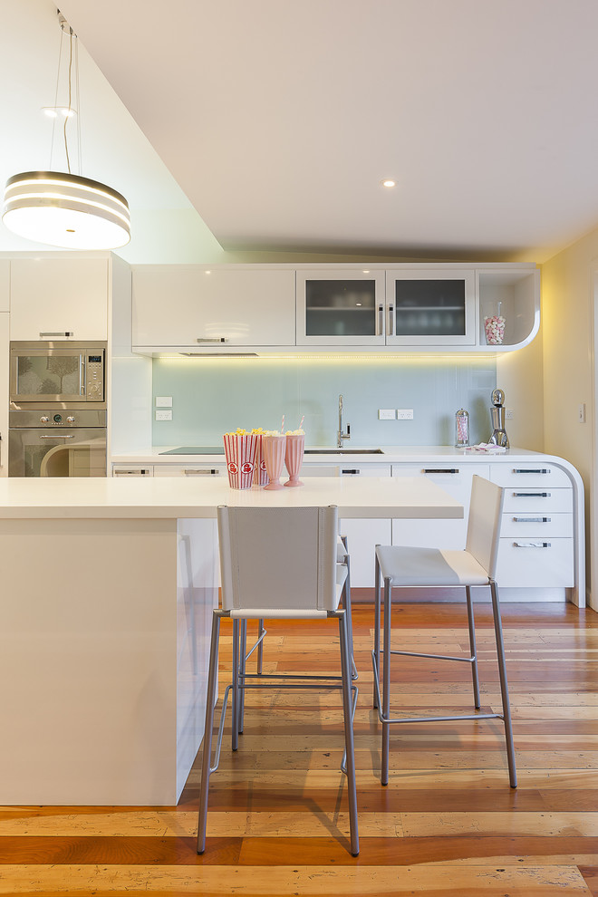 Inspiration for a contemporary kitchen in Auckland with stainless steel appliances.
