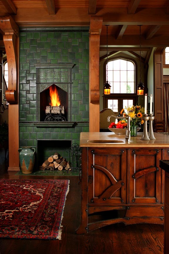 Eat-in kitchen - large craftsman l-shaped dark wood floor eat-in kitchen idea in Other with an undermount sink, flat-panel cabinets, light wood cabinets, granite countertops, green backsplash, stone slab backsplash, paneled appliances and an island