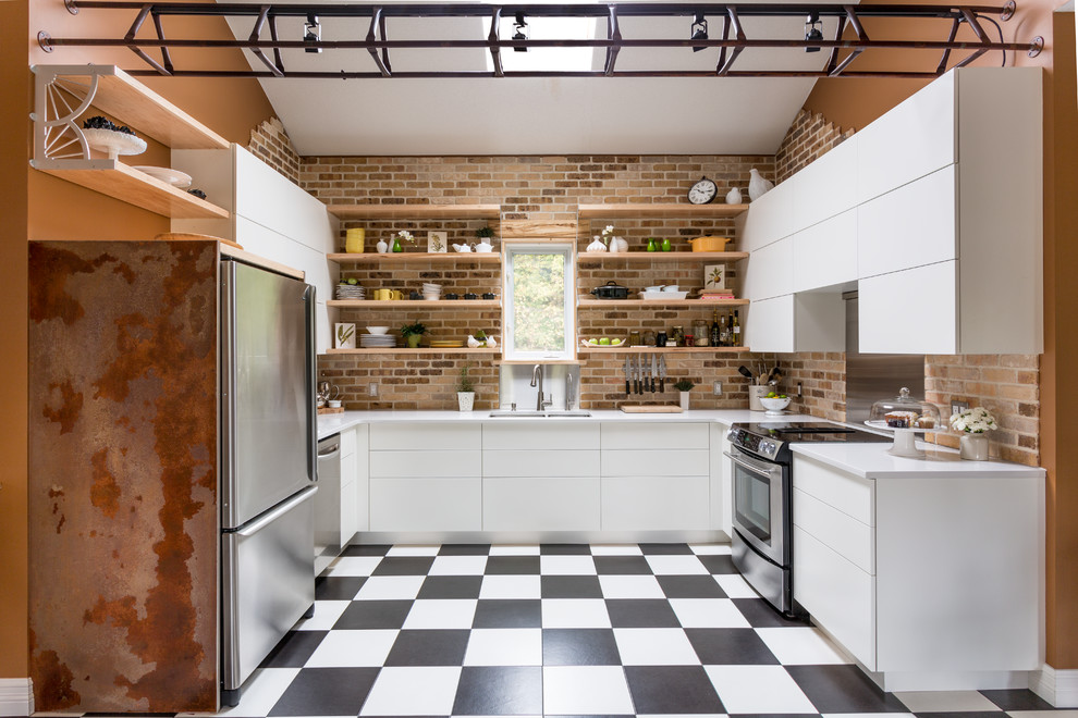 Example of a mid-sized urban u-shaped ceramic tile kitchen design in Toronto with a double-bowl sink, flat-panel cabinets, white cabinets, quartz countertops, multicolored backsplash, stone tile backsplash, stainless steel appliances and no island