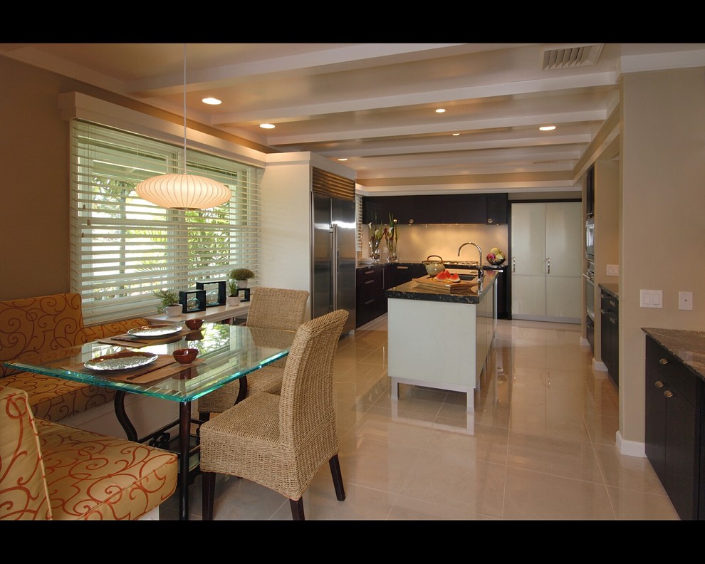 Example of a minimalist kitchen design in Hawaii with stainless steel appliances