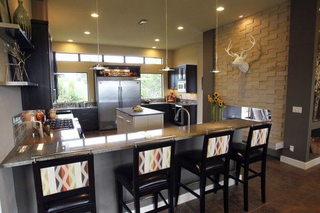 Eat-in kitchen - huge contemporary l-shaped multicolored floor eat-in kitchen idea in Austin with an undermount sink, shaker cabinets, dark wood cabinets, granite countertops, multicolored backsplash, mosaic tile backsplash, stainless steel appliances and an island