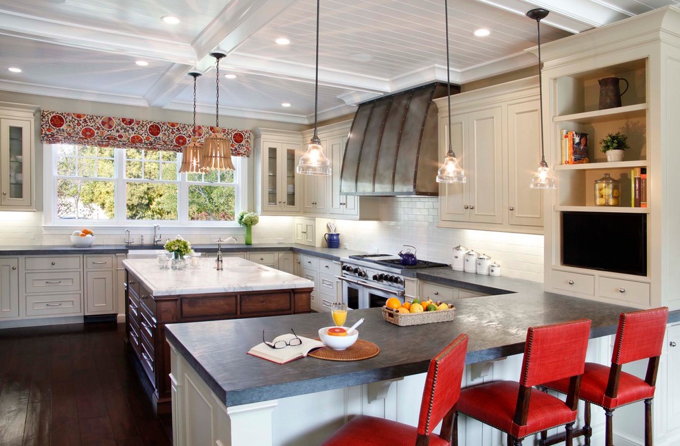 Inspiration for a timeless kitchen remodel in San Francisco with subway tile backsplash, soapstone countertops, beaded inset cabinets and beige cabinets