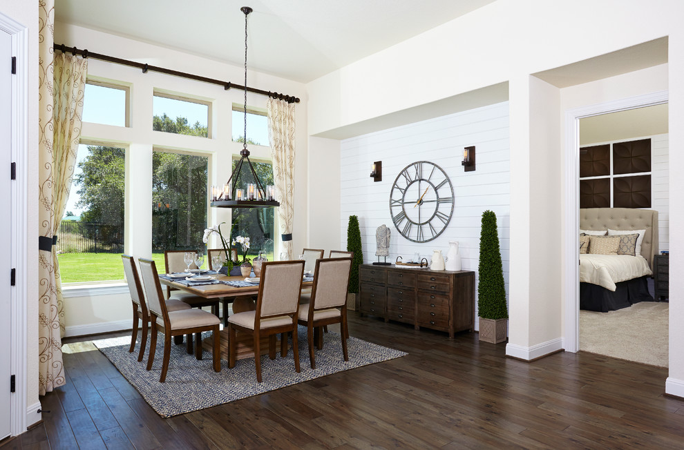 Design ideas for an expansive kitchen/dining room in Austin with dark hardwood flooring.