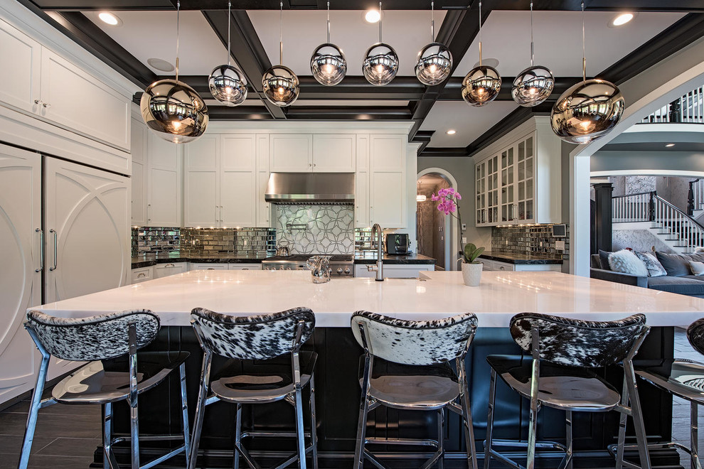 Example of a large transitional l-shaped black floor and vinyl floor enclosed kitchen design in Cleveland with shaker cabinets, white cabinets, an island, metallic backsplash, metal backsplash, paneled appliances, a farmhouse sink, quartzite countertops and white countertops
