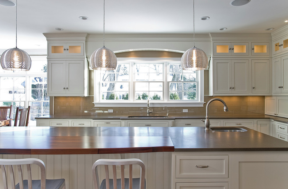Inspiration for a farmhouse kitchen in Boston with wood worktops.