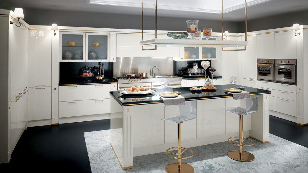 Example of a large classic u-shaped marble floor eat-in kitchen design in Melbourne with a double-bowl sink, raised-panel cabinets, white cabinets, quartzite countertops, metallic backsplash, stone slab backsplash, colored appliances and a peninsula