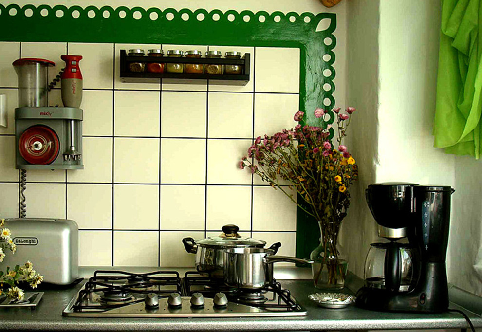 Kitchen - eclectic kitchen idea in Other