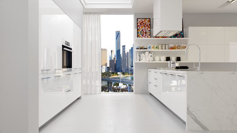Ejemplo de cocina minimalista con armarios con paneles lisos y encimeras blancas