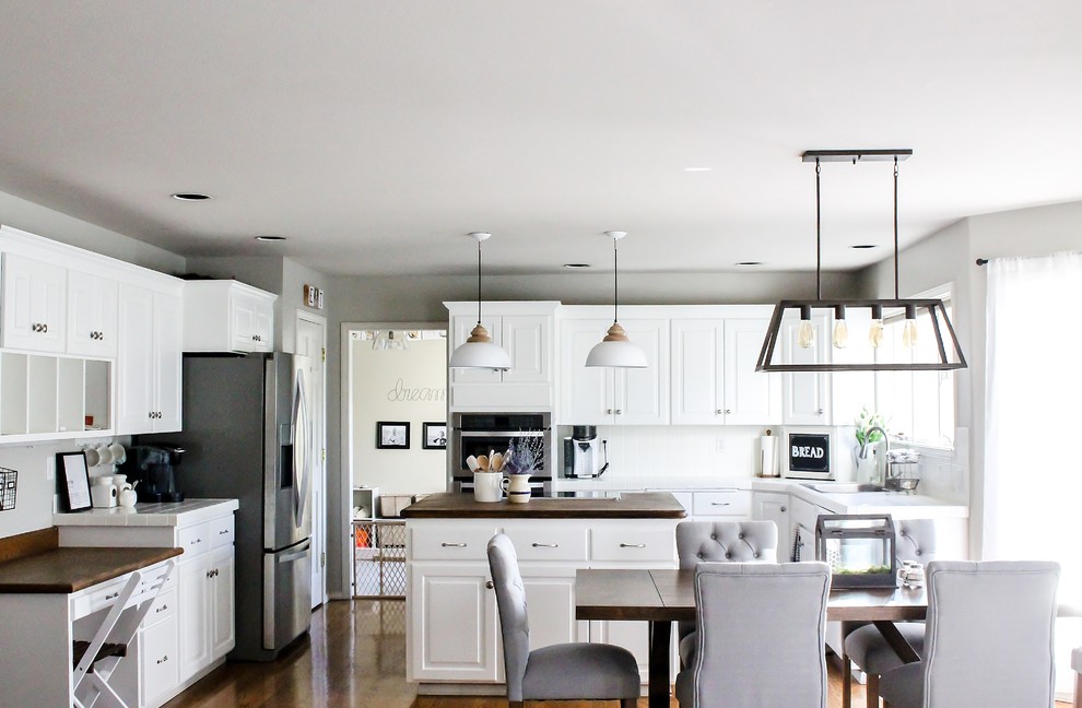 This is an example of a large farmhouse kitchen in Seattle.