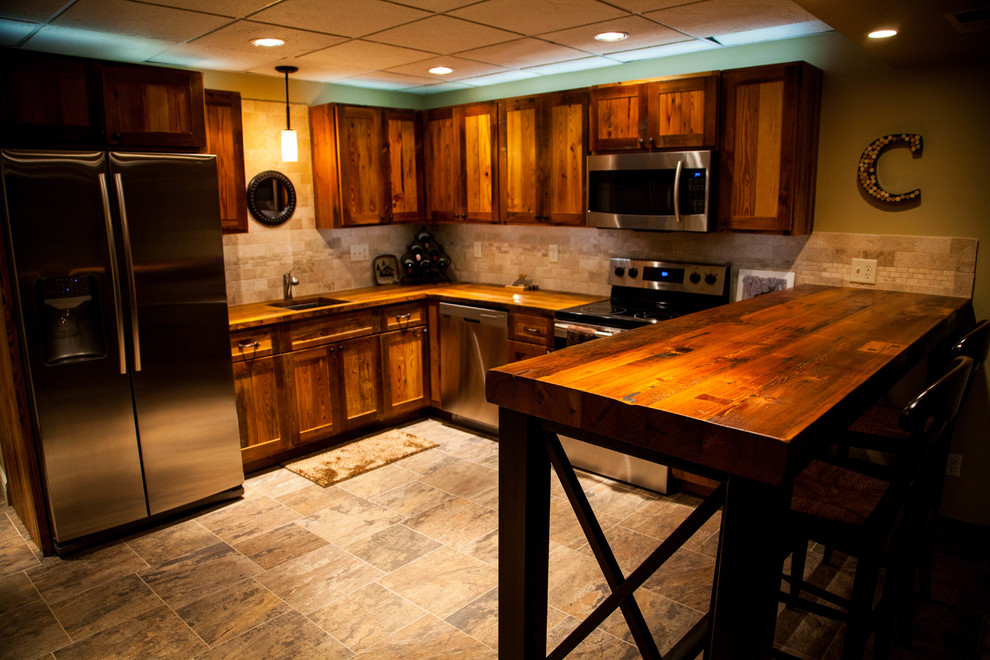 Example of a large mountain style kitchen design in Kansas City
