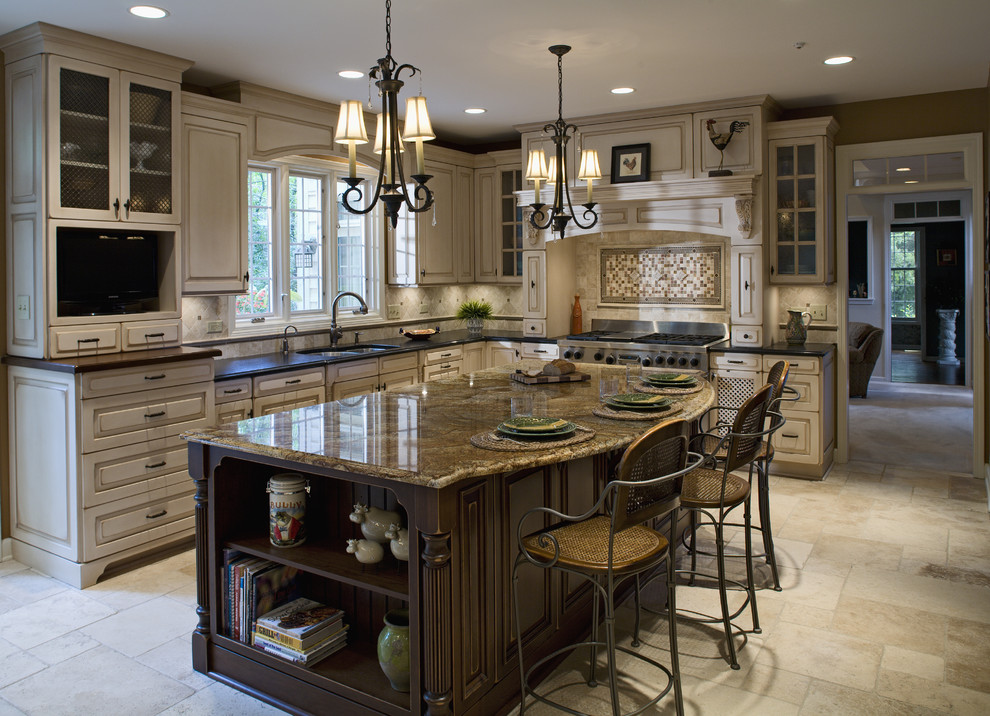 Example of a classic kitchen design in Chicago with glass-front cabinets and brown countertops
